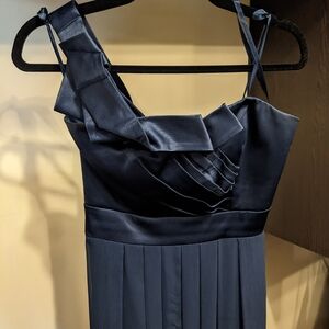 Navy blue floor length gown.